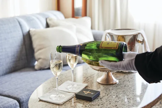 Butler serving champagne, Silver Wind